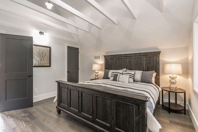 Ceiling beams in renovated bedroom