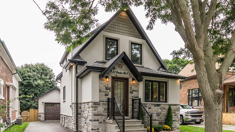 Exterior porch addition with brick