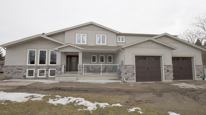 House with 4 bay garage